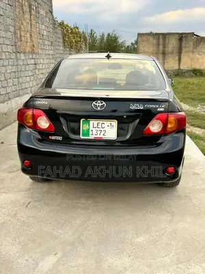 XLI Black Sedan 2009 - Well-Maintained Compact Car