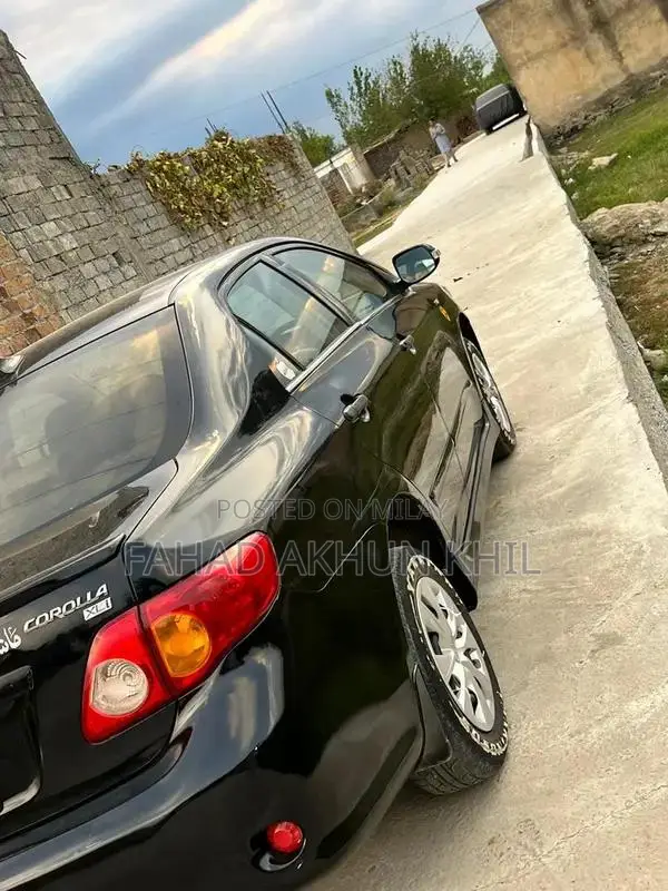 XLI Black Sedan 2009 - Well-Maintained Compact Car