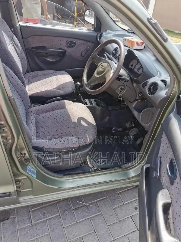 Hyundai Santro Club 2003 Green Compact Sedan with Modern Features