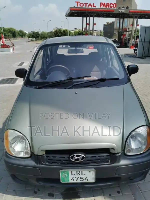 Hyundai Santro Club 2003 Green Compact Sedan with Modern Features