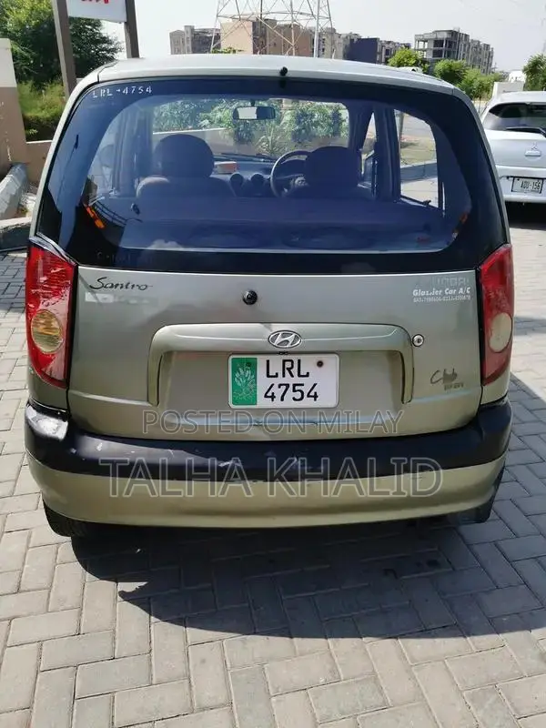 Hyundai Santro Club 2003 Green Compact Sedan with Modern Features