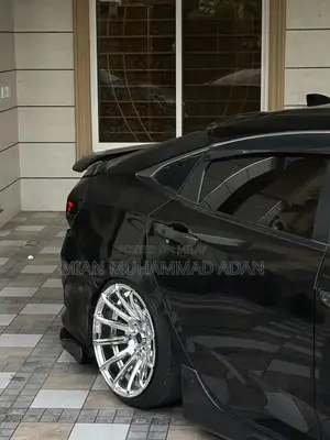 Photo - 17-inch Chrome North Wheels with 205/40R17 Tires - Pristine Condition