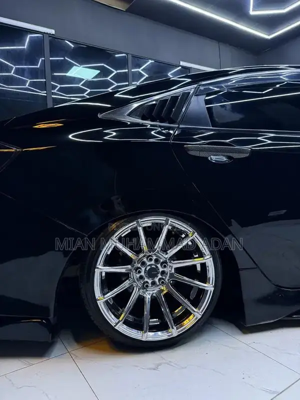 17-inch Chrome North Wheels with 205/40R17 Tires - Pristine Condition