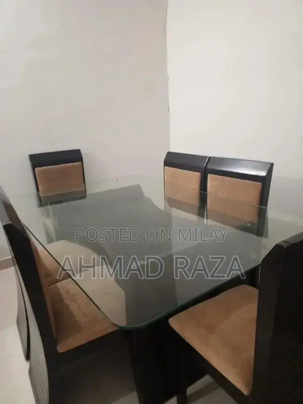 Glass Top Dining Table with 6 Seating Capacity
