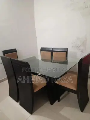 Glass Top Dining Table with 6 Seating Capacity