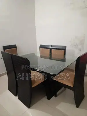 Glass Top Dining Table with 6 Seating Capacity