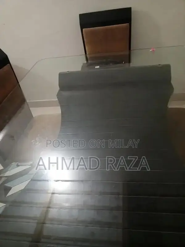 Glass Top Dining Table with 6 Seating Capacity