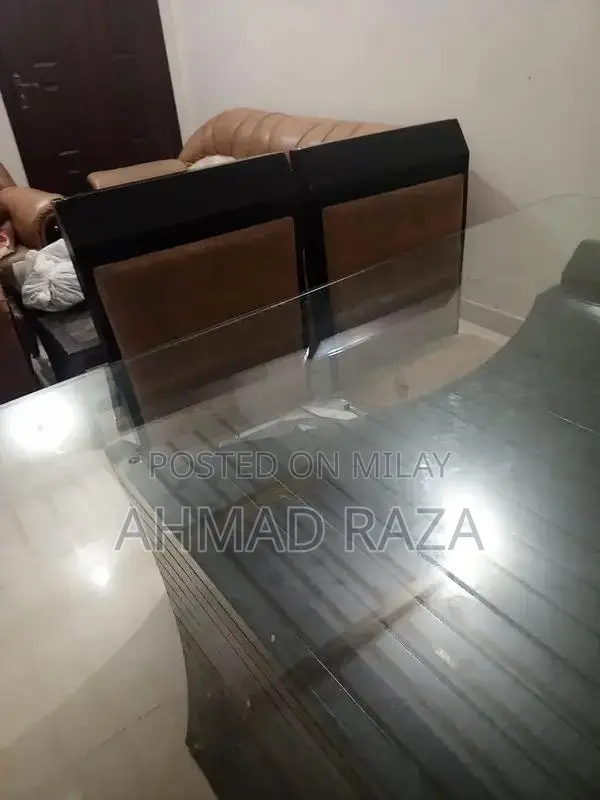Glass Top Dining Table with 6 Seating Capacity