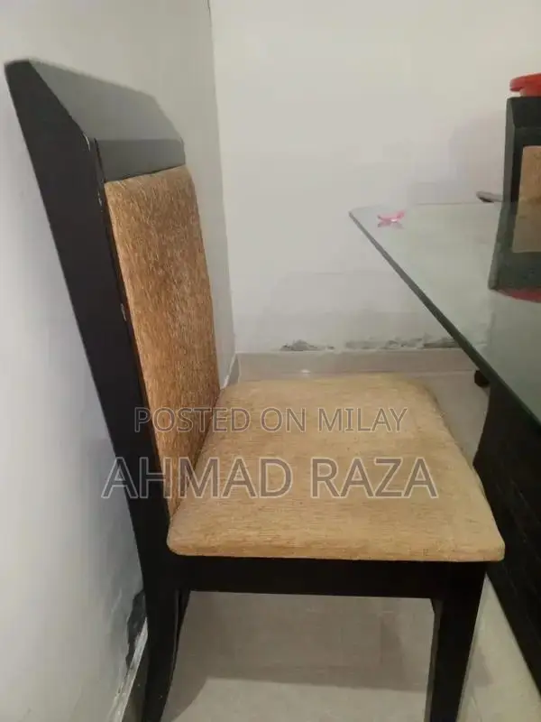 Glass Top Dining Table with 6 Seating Capacity