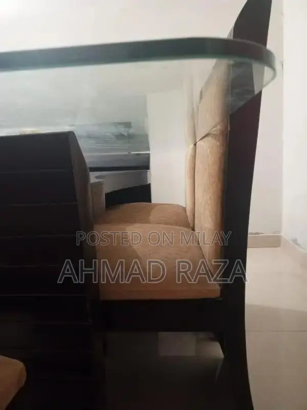 Glass Top Dining Table with 6 Seating Capacity