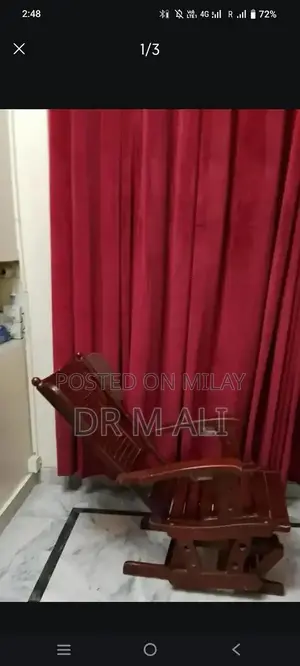 Photo - Classic Wooden Rocking Chair - Traditional Home Comfort