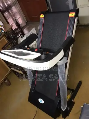 Photo - World Fitness TM1750 Folding Home Treadmill with Incline