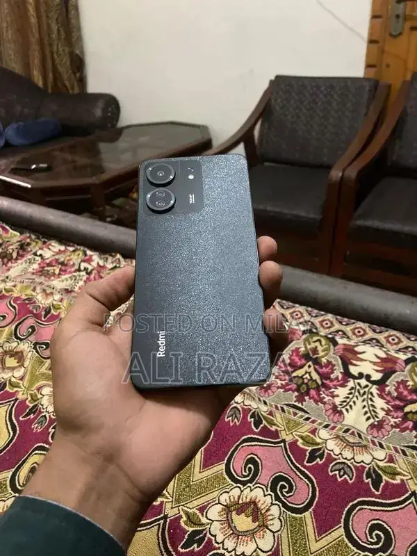 Sleek Smartphone with Original Packaging and Full Functionality