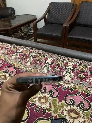 Sleek Smartphone with Original Packaging and Full Functionality