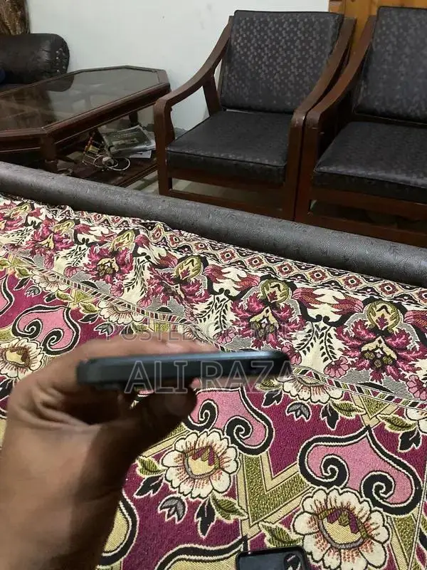 Sleek Smartphone with Original Packaging and Full Functionality