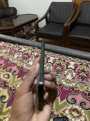 Sleek Smartphone with Original Packaging and Full Functionality