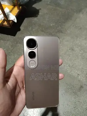 Photo - Compact 5G Smartphone with Modern Connectivity