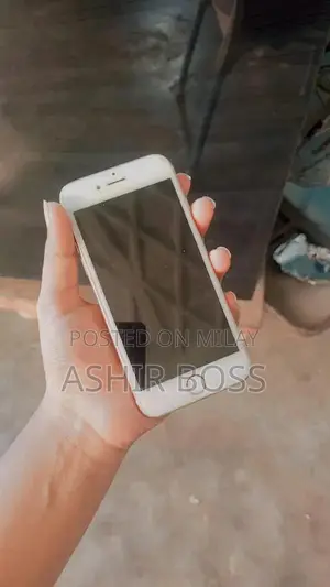 Smartphone with Charging Cable in Good Condition