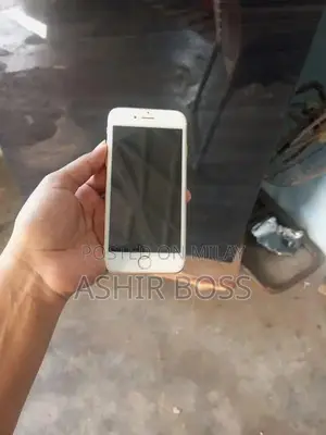 Smartphone with Charging Cable in Good Condition