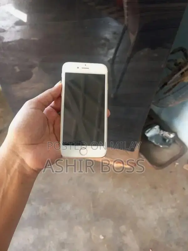 Smartphone with Charging Cable in Good Condition