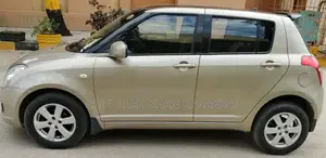 2016 Suzuki Swift Automatic Sedan - Golden Color