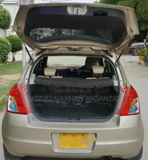 2016 Suzuki Swift Automatic Sedan - Golden Color