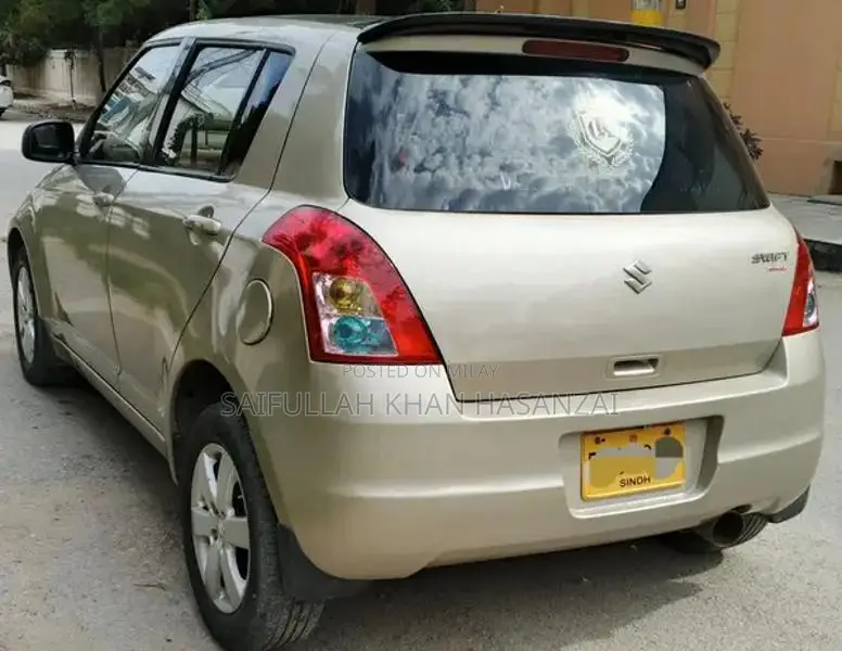 2016 Suzuki Swift Automatic Sedan - Golden Color