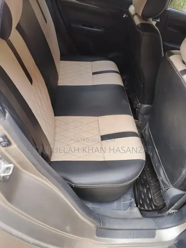 2016 Suzuki Swift Automatic Sedan - Golden Color