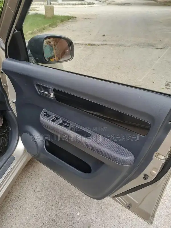 2016 Suzuki Swift Automatic Sedan - Golden Color