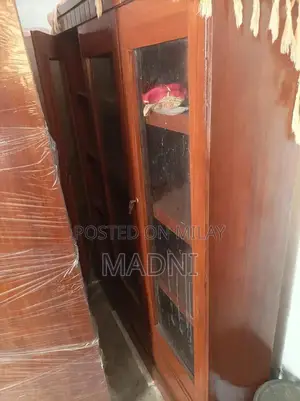 3-Door Wooden Showcase Almirah with Elegant Design