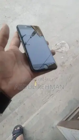 Photo - 32GB iPhone 7 Mobile Smartphone with Battery Pack