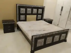 Photo - King Size Bed Frame with Mattress and Side Tables