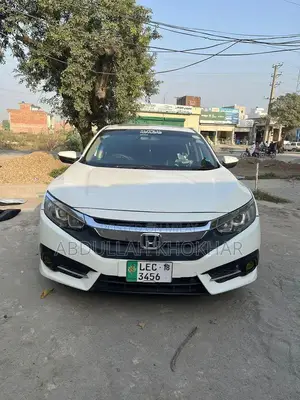 Photo - Honda Civic Sedan Red Full Option Performance Model