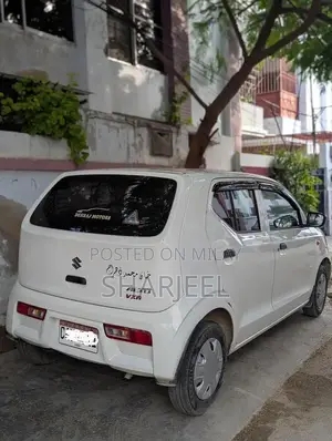 Photo - Suzuki Alto 2024-2025 Compact White Sedan