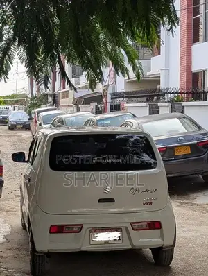 Suzuki Alto 2024-2025 Compact White Sedan