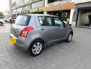Suzuki Swift Compact Sedan - Smoke Grey Metallic