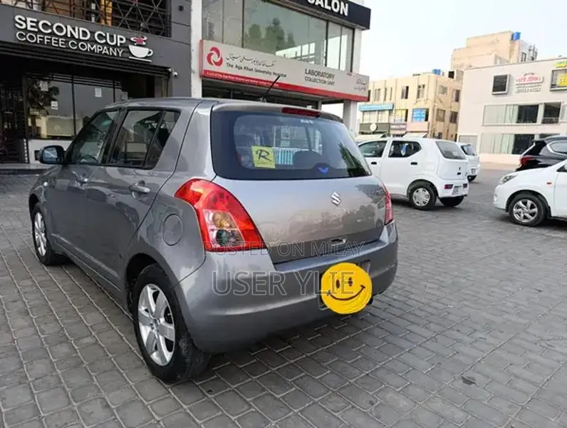 Suzuki Swift Compact Sedan - Smoke Grey Metallic