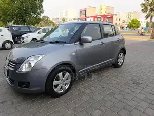 Suzuki Swift Compact Sedan - Smoke Grey Metallic