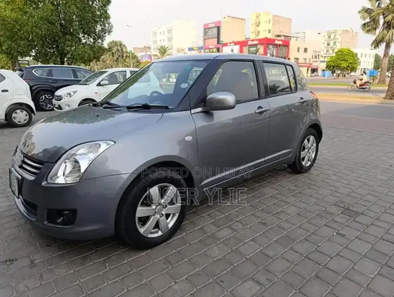 Suzuki Swift Compact Sedan - Smoke Grey Metallic
