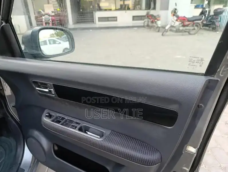 Suzuki Swift Compact Sedan - Smoke Grey Metallic