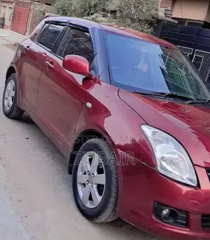 Photo - Suzuki Swift DLX Compact Sedan - Low Mileage Second Owner Vehicle