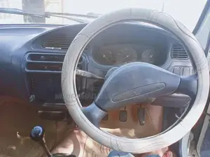 Daihatsu Cuore Compact Sedan - 2003/2004 Model