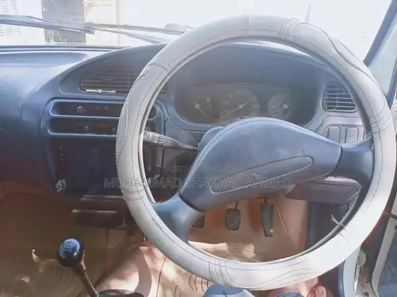 Daihatsu Cuore Compact Sedan - 2003/2004 Model