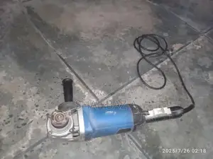 Photo - Blue Compact Manual Grinder in Good Working Condition