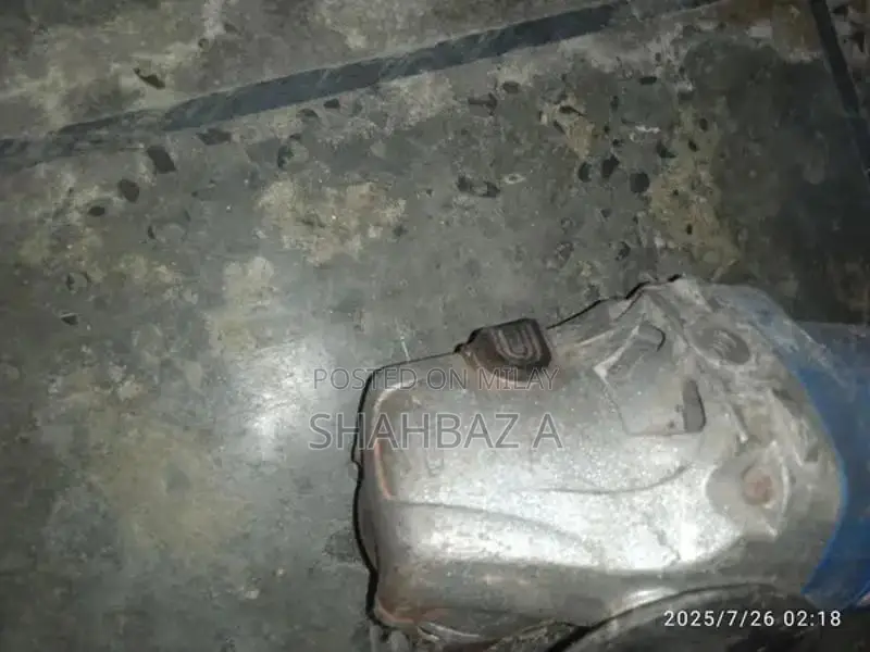 Blue Compact Manual Grinder in Good Working Condition