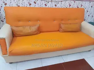 Photo - Comfortable Sofa with Two Decorative Cushions