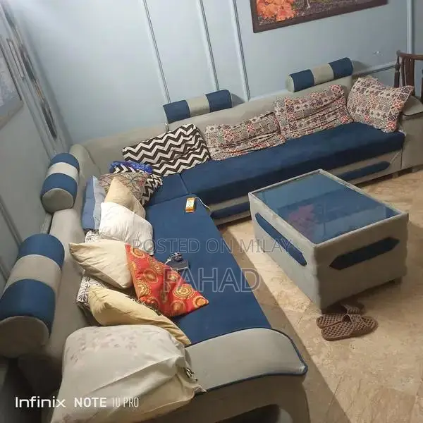 Complete Home Furniture Set with Sofas, Dining Table, and Painting