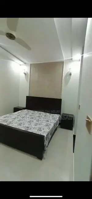 Photo - Elegant Brown Wooden Bed Set with Matching Side Tables