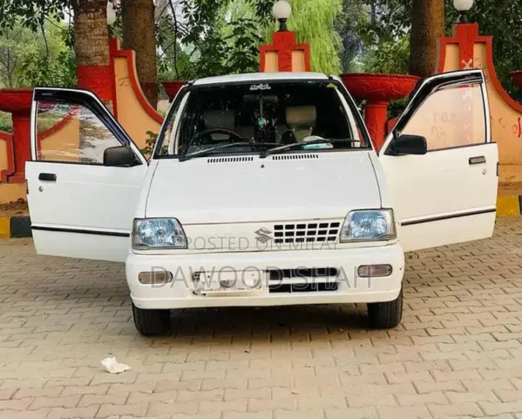 Mehran White Sedan with Alloy Rims and LCD Display