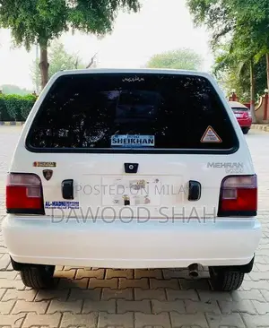 Mehran White Sedan with Alloy Rims and LCD Display